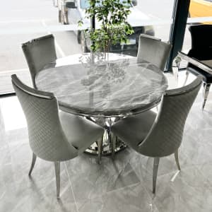 marble table crushed velvet chairs