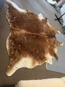 Cowhide rug white belly spine
