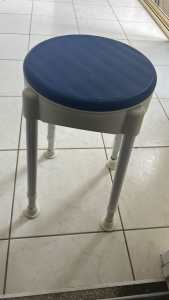 Adjustable shower stool