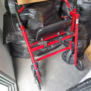 Brand new walker on wheels with a seat