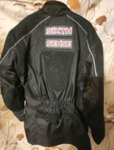 BRAND NEW HIGH QUALITY MOTORCYCLE JACKET WITH TAGS STILL ON (Large)