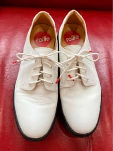 ROLLIE WHITE LEATHER WITH BLACK SOLE DERBY CITY. SIZE 40.