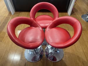 3 red height adjustable bar stools with back rest