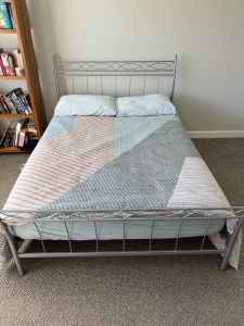Silver double bed frame.