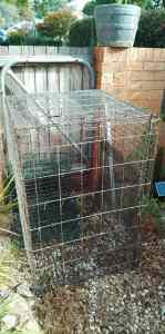 XL crate wrapped in chicken wire 