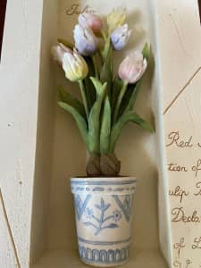 Wall plaque, three-dimensional, featuring tulips.