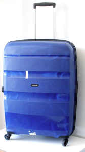Large sized hardshell suitcase by American Tourister. Four good wheels