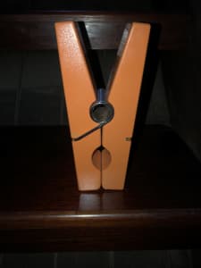 Large orange decorative wooden peg