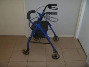 Wheelie Walker, with carry basket under and fold up seat.