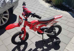 Red Kids MX-30 Hyber-Bike with Training Wheels in New Condition