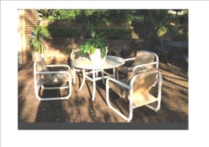 Outdoor setting. Table and 4 chairs