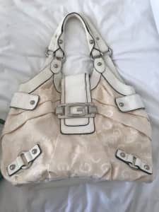By Guess Hand bag, over shoulder type PUO.$10 now