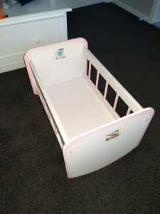 Childs toy rocking cot for dolls