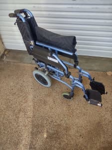 SOLD Wheel Chair Excel Freedom brand.