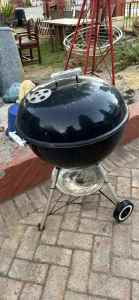 Old black Weber kettle bbq