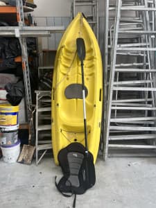 Kayak with seat and paddle