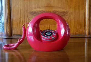 Retro FLASH REDIAL telephone, red plastic case