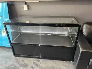 Glass display cabinets, inbuilt lighting, lockable storage