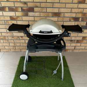 Weber Baby Q100 BBQ with Stand Used.