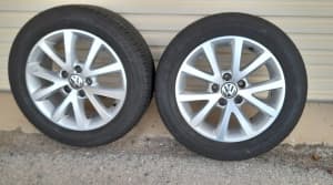 Two tyres and rims from VW Estate.