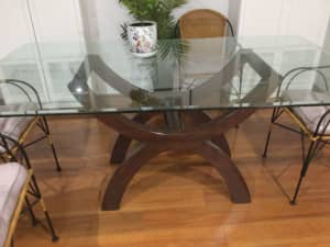 Glass topped dining table