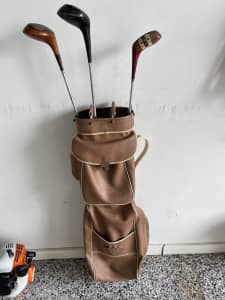 Vintage golf bag and wooden clubs