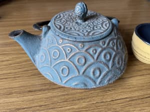 Tea pot and 2 cups, enamelled cast iron