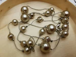 Brand new faux silver pearl necklace