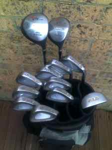 Matched full set of Fila graphite shaft clubs with immaculate bag