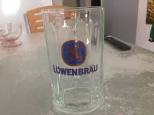 German beer mug (LOWENBRAU) with handle.