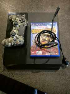 Ps4 500g with the cord a controller and a game 
