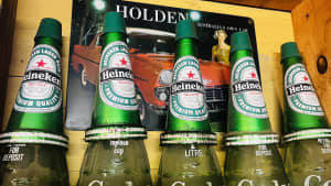 Oil Bottle Caps in Heineken Livery