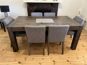 Dinning Table with 6 chairs in good condition