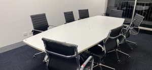 Boardroom meeting table and chairs