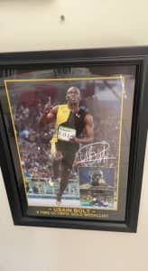 Signed Usain Bolt framed picture