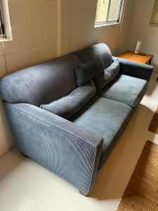 Blue corduroy couch retro