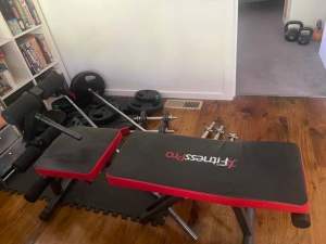 Home gym fitness equipment bench and weights