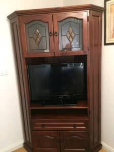 TV cabinet with glass doors and shelves