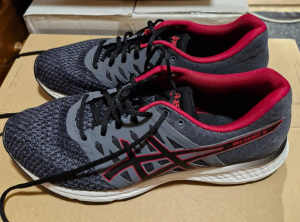 Asics runners.Red and grey.Size 11US.6 months old.Seldom used.Too big.