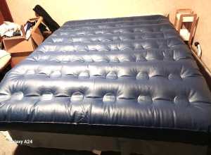 An inflatable double bed air mattress
