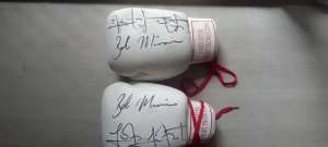 Signed gloves. 2008 souvenir from fight Bob Mirovic & John Hopoate.