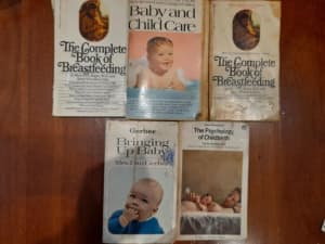 selection of old and vintage baby care books