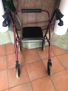 Mobility Walker with Seat, Good Wheels and Brakes. Good Condition