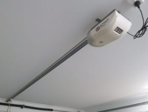 Free -Smart Lifter sectional garage door opener and track just removed