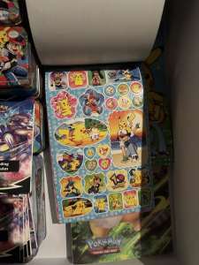 Pokemon card tins folders and stickers