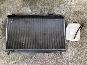NISSAN 350Z RADIATOR AND COOLANT OVERFLOW COMBO MISC LEFT OVER SPARES