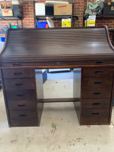 dark wood roll top desk