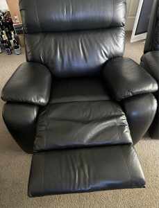 2 leather reclining single seat chairs