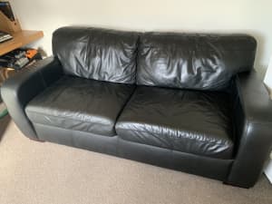 Black leather sofa bed