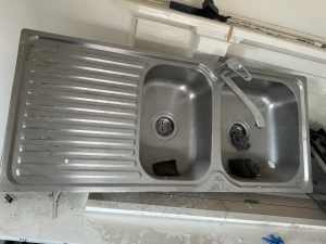 For sale: Double-bowl kitchen sink with tap
